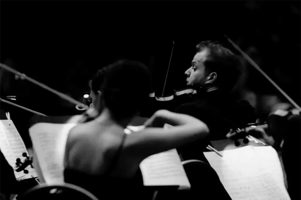 Camerata Pelsonore string section performing live in Budapest (black and white)